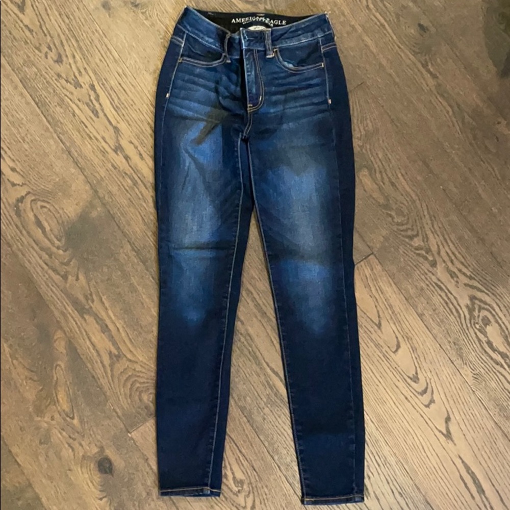 High rise dark wash jegging. Size 2
